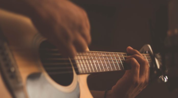 Guy Plays the Law & Order: SVU Theme on Acoustic Guitars