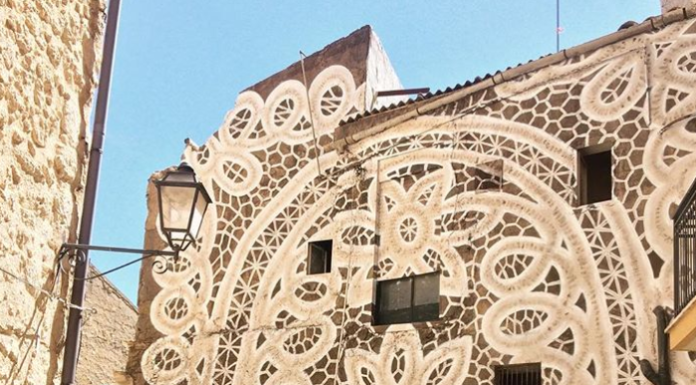 Artist Decorates Buildings With Lace Murals