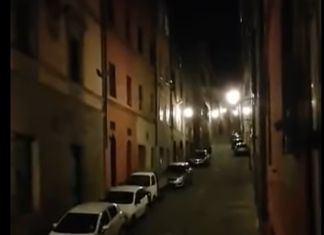 Italian Neighbors Sing Together on Windows While in Quarantine