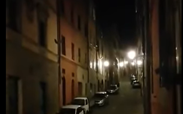 Italian Neighbors Sing Together on Windows While in Quarantine
